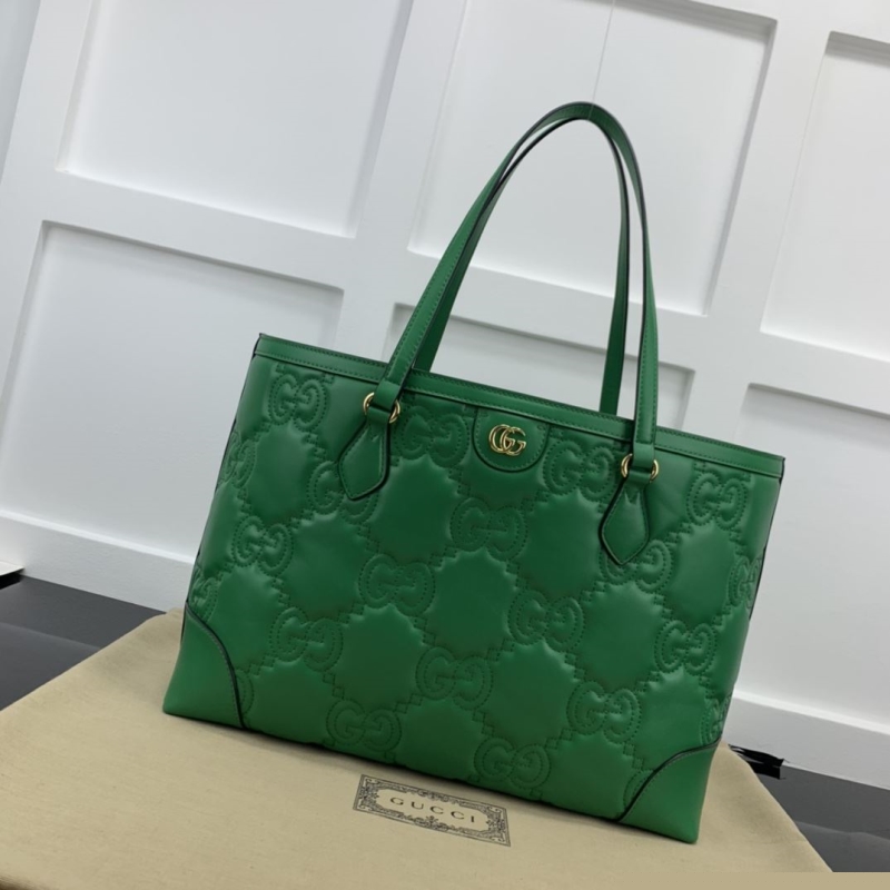 G*u*i shopping bags